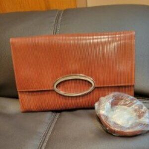Joan and David CLUTCH Handbag